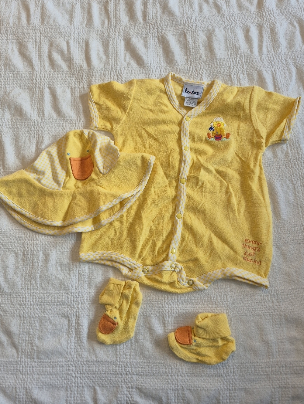 Le Top romper 9 M new has marks from storage never washed hat booties NEW